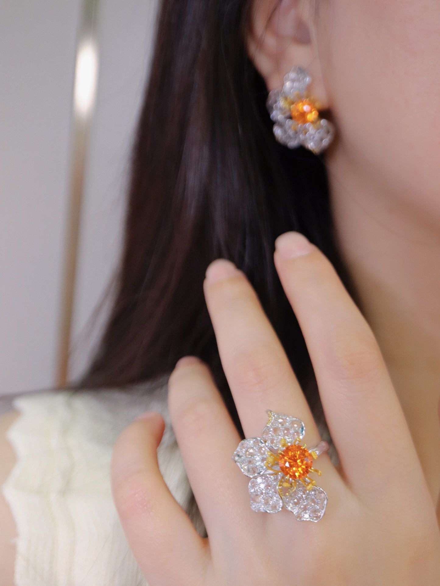 Spessartite Garnet Set with 18K Gold and Diamonds