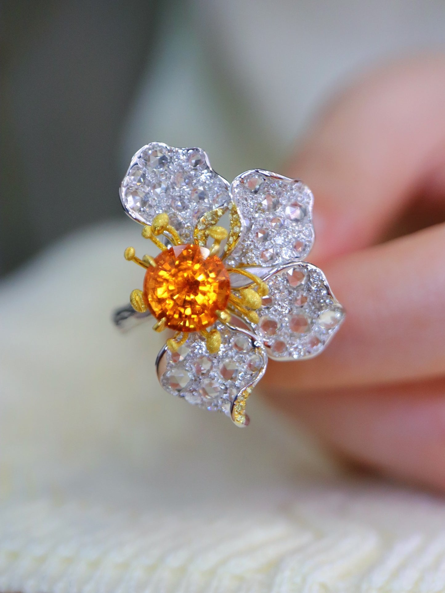 Spessartite Garnet Set with 18K Gold and Diamonds