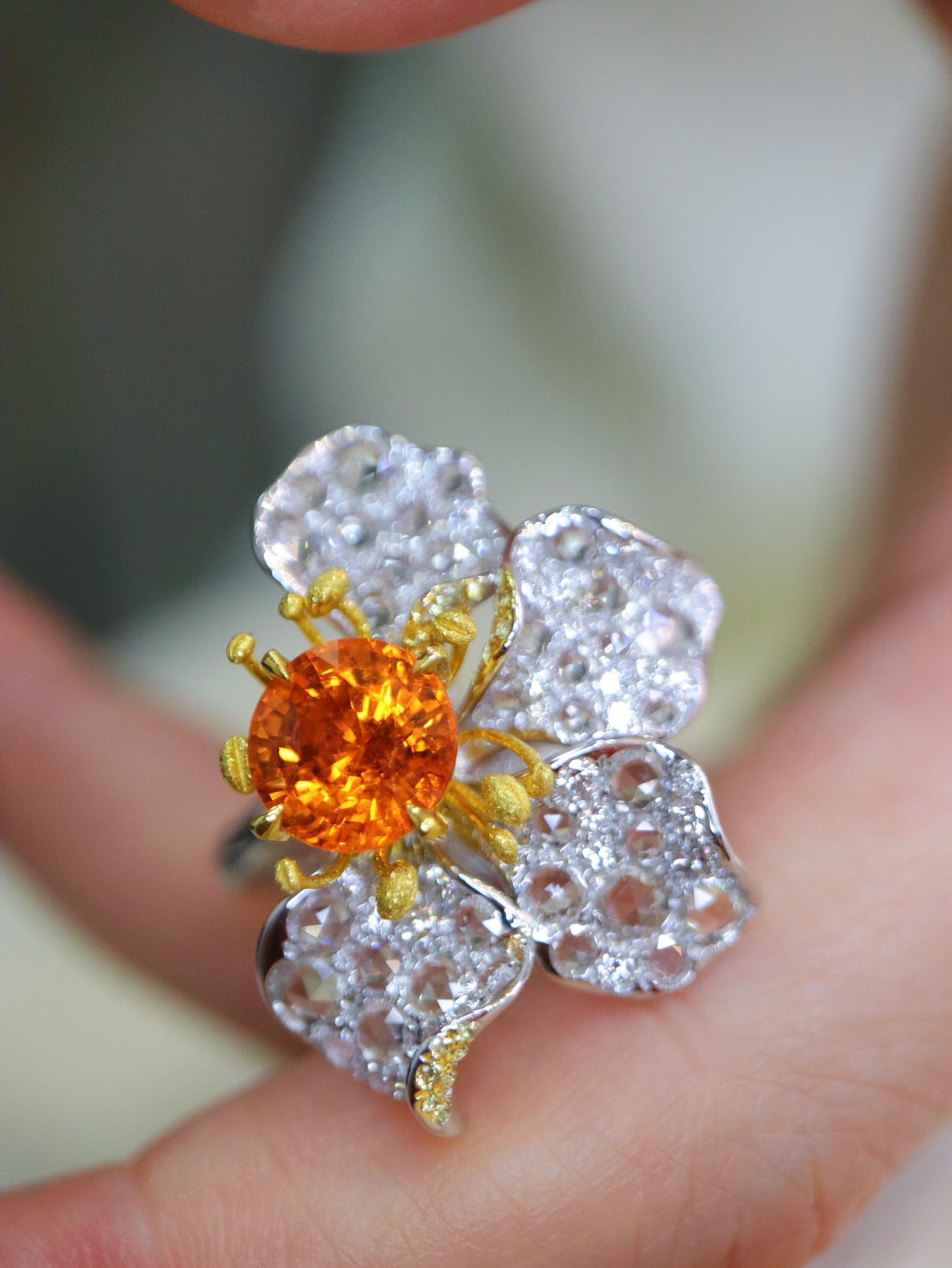 Spessartite Garnet Set with 18K Gold and Diamonds
